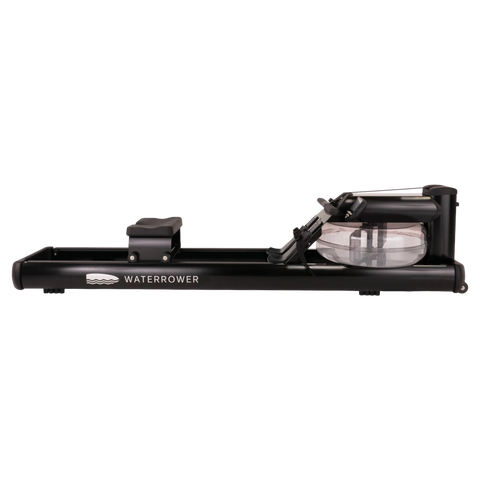 A black water rower exercise machine with a transparent water tank, shown from a side profile view on a solid white background.