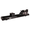 A black Waterrower rowing machine with a transparent water tank, shown from a side angle on a solid white background.